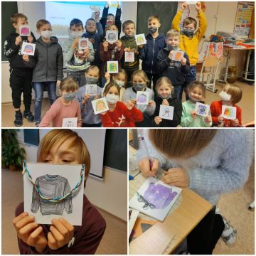 bērni ar zīmējumiem