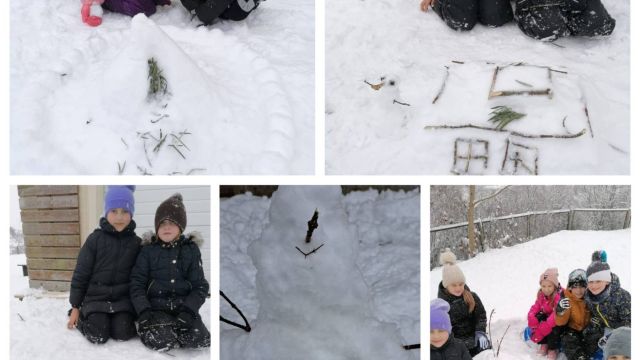 Bērni veido sniega skulptūras