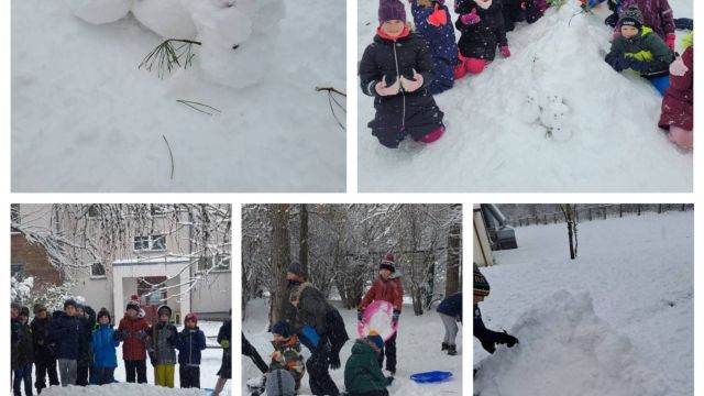 Bērni veido sniega skulptūras