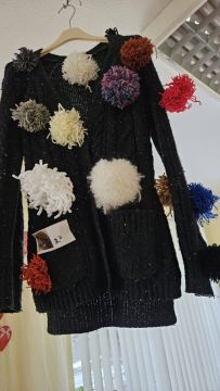 Silto džemperu diena